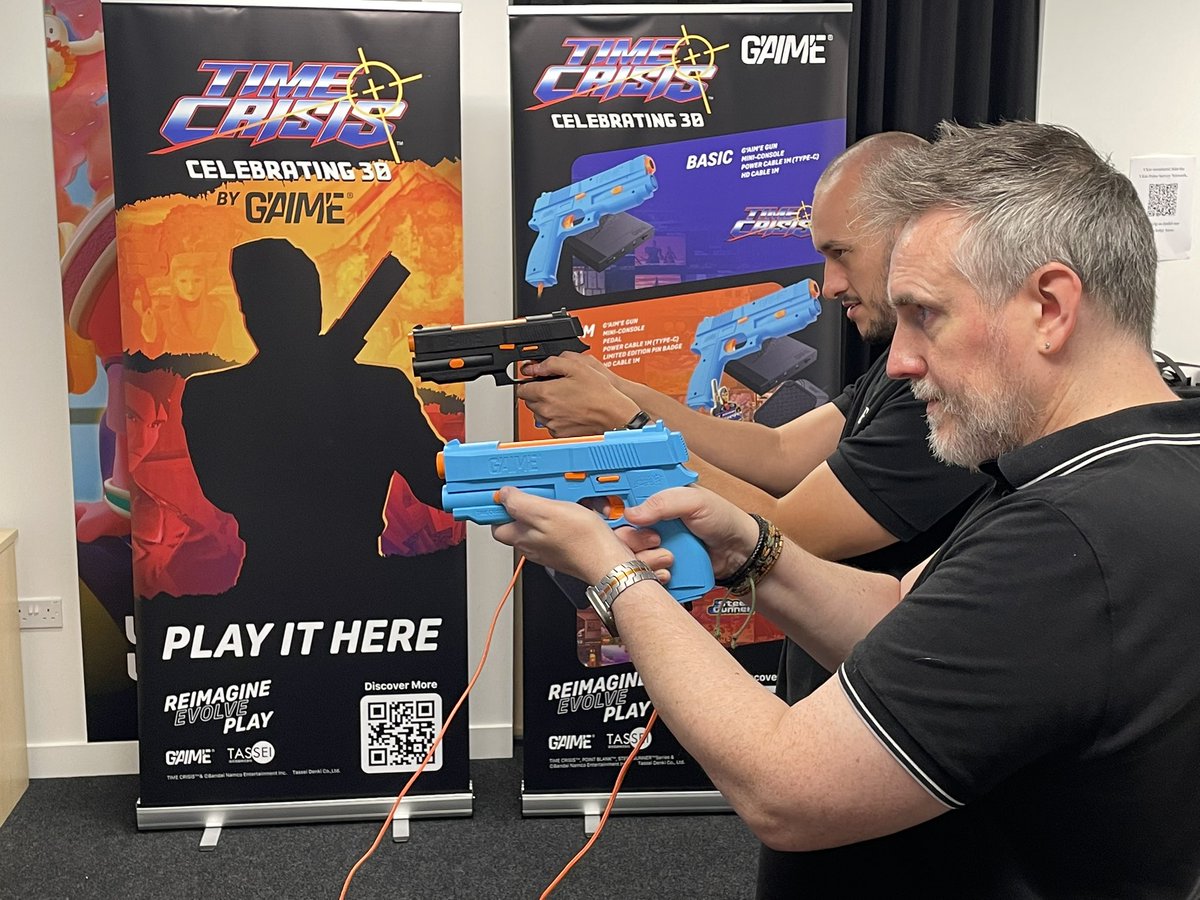 OverloadComms's tweet image. The Overload team are in London today with our friends @MyGAIME giving some lucky media a first play of the incredible new Time Crisis gun and mini console the lovely @RikHenderson has still got it…