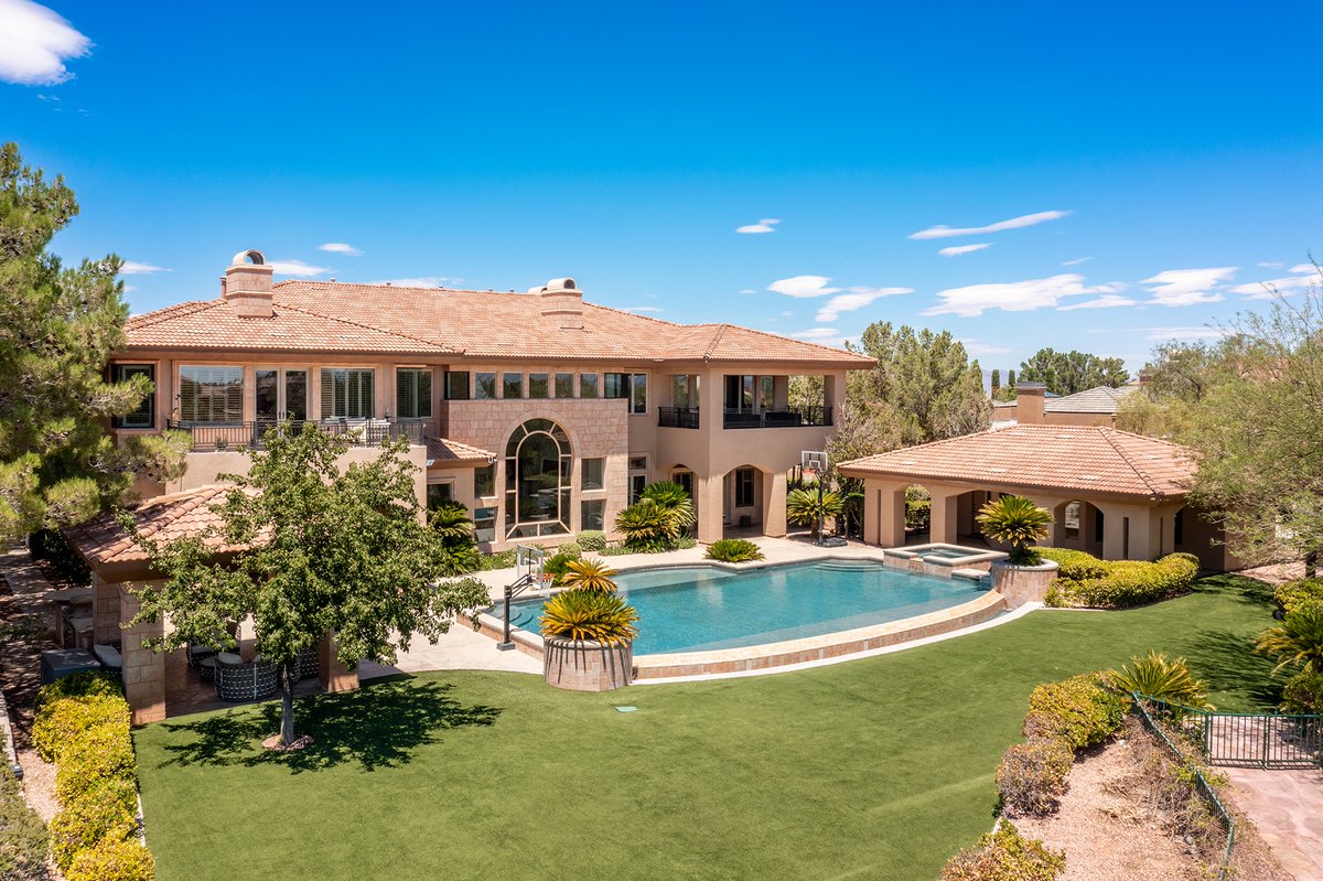 Tucked within guard-gated Queensridge, this European-inspired masterpiece offers a once-in-a-lifetime opportunity. Set on an ultra-rare 1.13-acre lot, the estate spans over 11,400 sqft with 8 en-suite bedrooms.

9801 Orient Express Court - Las Vegas, NV USA⁠