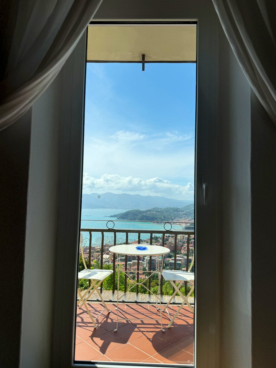 The view from our bed… INSANE. Balcony RAILING anyone? 🤪