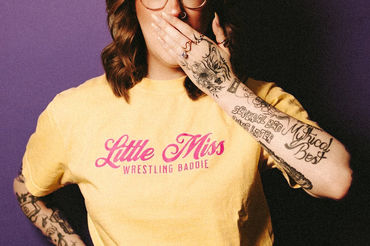 wwdcast's tweet image. The Little Miss Wrestling Baddie collection is live now!
Because being a wrestling fan and that girl? It's not mutually exclusive. 💖
Modeled by @haleyrumbles and @EditorialDani, this is the perfect new piece for your collection.
shop.wrestlingwinedownlv.com