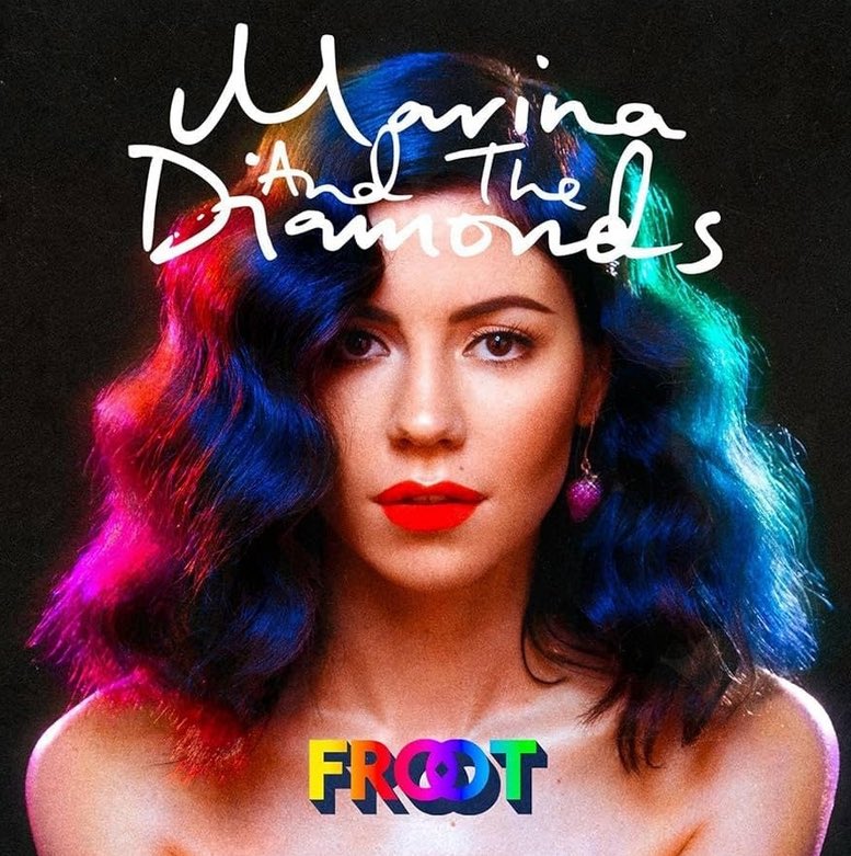 mindbombrecords's tweet image. Now In Stock: Marina And The Diamonds-Froot 10th Anniversary Edition 2LP On Red Vinyl.
Praised for its lush production and introspective lyricism, the record remains a cornerstone of Marina’s discography, celebrating themes of growth, love, and self-discovery.