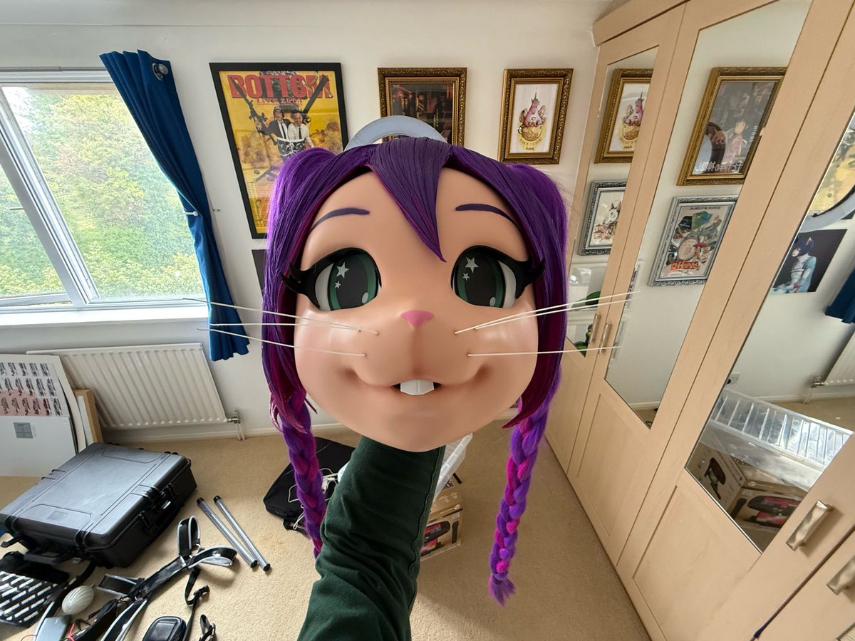 Polytherian's tweet image. My mouse, Indigo, has had a new hair, as her previous hair was big, difficult to manage &amp;amp; getting caught in the zip. 

She went to a specialist last week and now sporting a whole new hairdo!

She looks absolutely fabulous, and I can’t wait to transform into RaverRodent soon!￼
