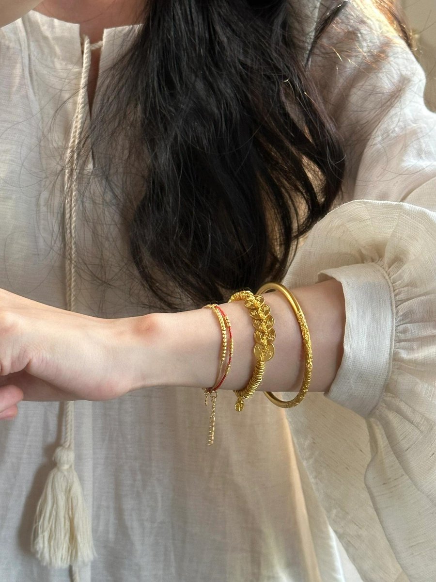 mj694447's tweet photo. There’s something about gold that whispers grace. This bracelet? It's not just jewelry, it's a vibe wrapped around my wrist.💛✨ https://t.co/UoPkB7YpRk