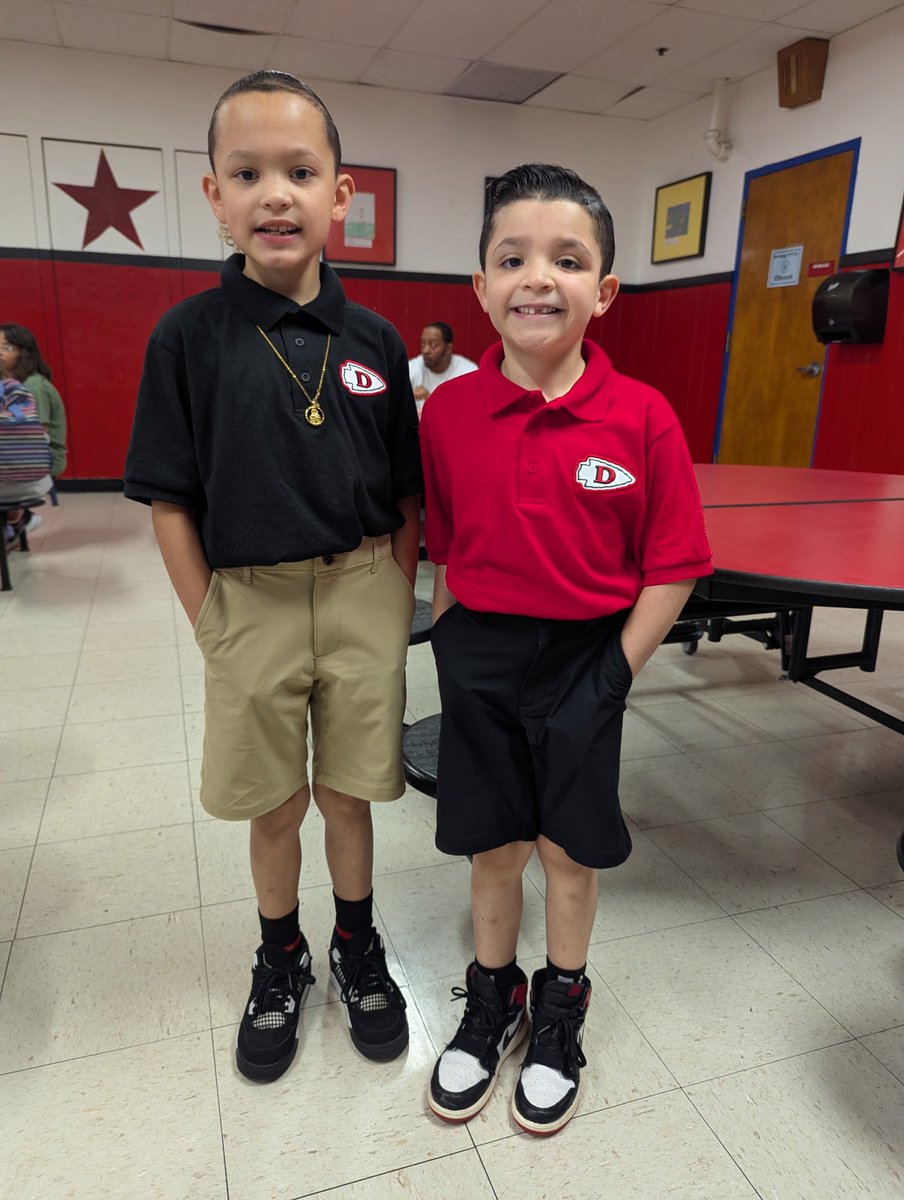 Showing off their new uniforms on the last day of summer school!! They are ready for the new school year!