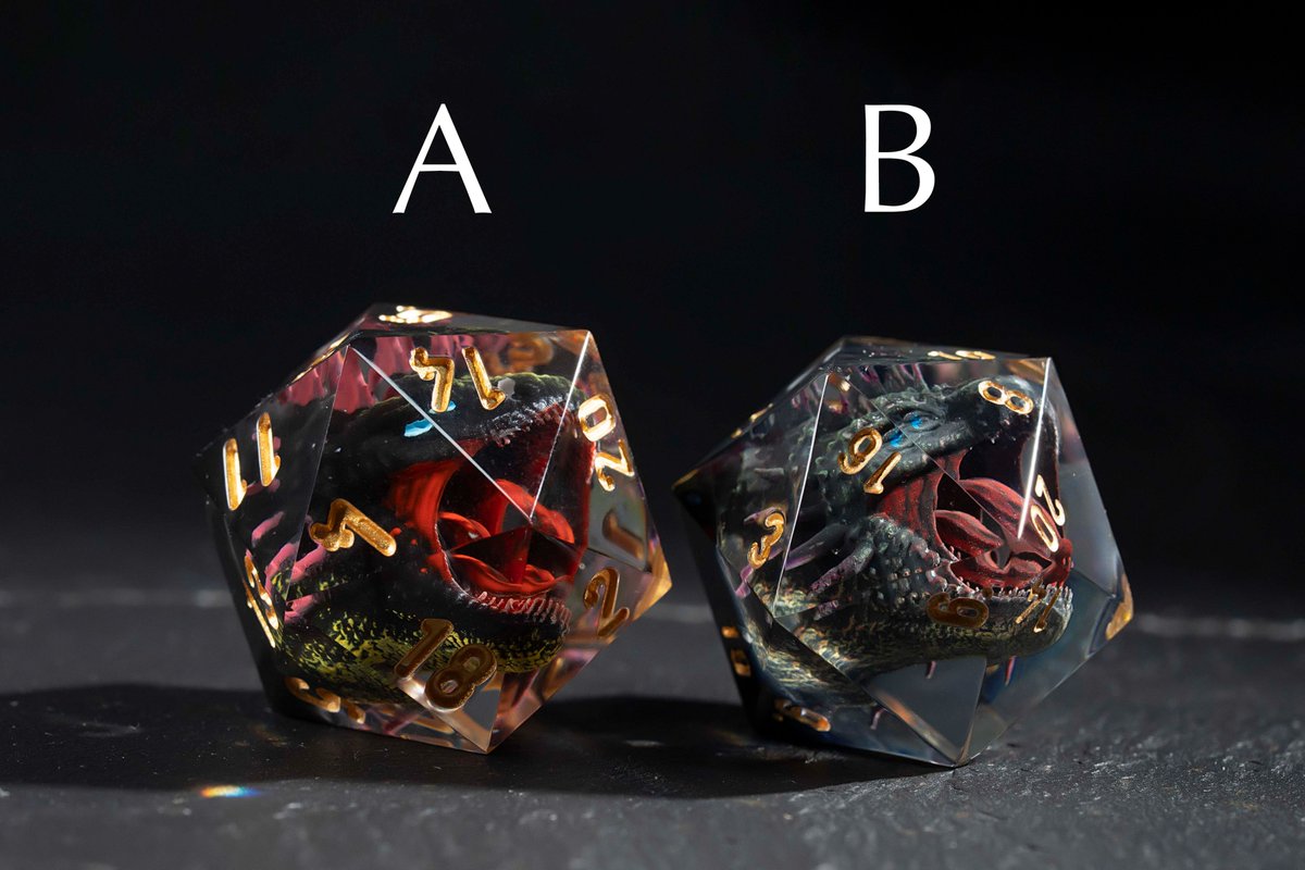 CrystalMaggie2's tweet image. 🔎Explore Your Dice Choices😉
Option A: a powerful black and red design, embodying fierce strength.
Option B: a mystical blue-green hue, representing depth and mystery.
Which one speaks to you? Share your thoughts, let's create a unique D&D gaming experience together!🎲🐉💞