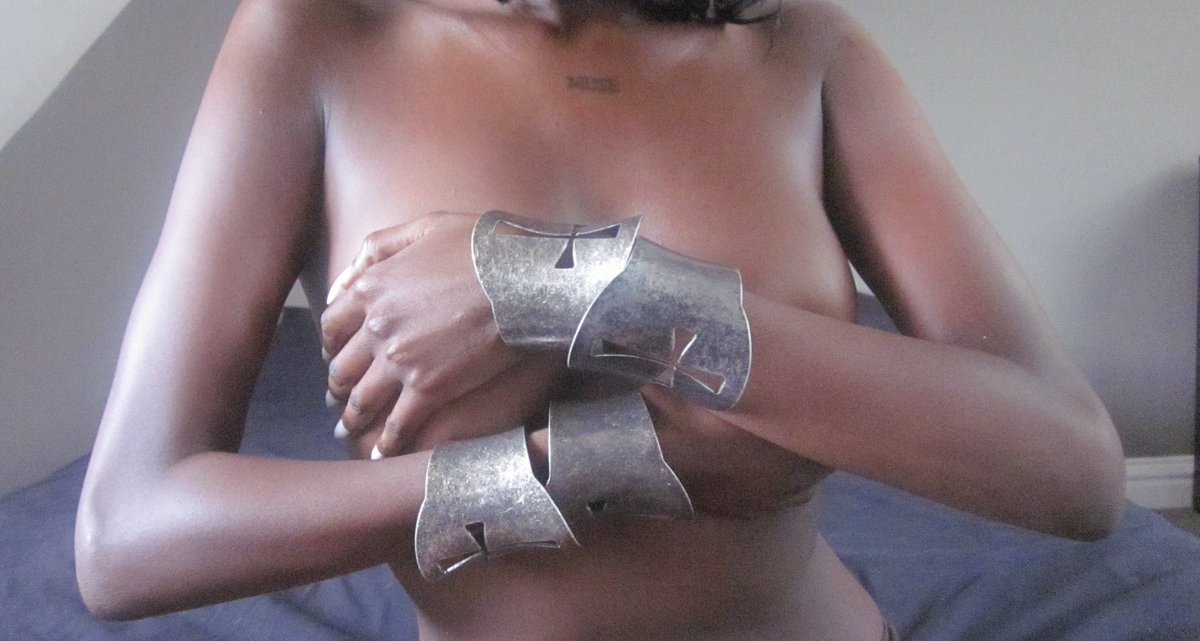 Tanastwa, wearing the Bone Cross Cuff by Joélle🖤