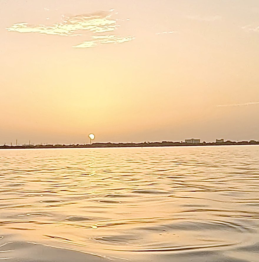 KipAuthor's tweet image. Sunrise from the mouth of the Eau Gallie River.