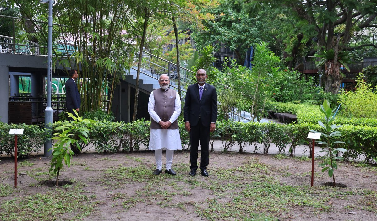 narendramodi's tweet photo. India and the Maldives fully understand the challenges of climate change and environmental degradation. And, we are committed to doing everything possible to boost sustainability. 

This evening in Malé, President Muizzu and I planted saplings, strengthening ‘Ek Ped Maa Ke Naam’ (a tree for Mother) initiative and Pledge of 5 million Tree Plantation of the Maldives Government.

@MMuizzu
