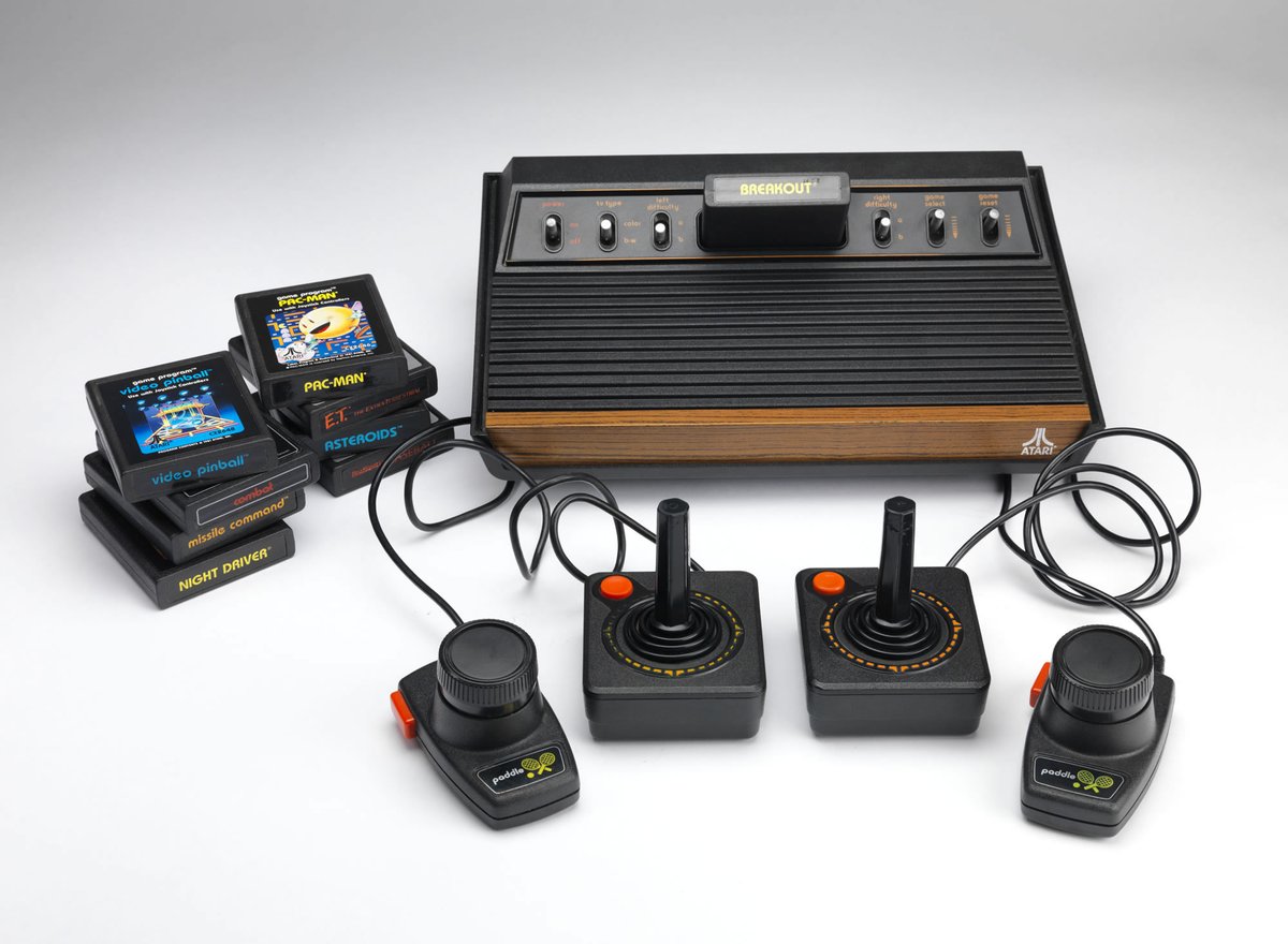 I got my Atari 2600 second-hand around 1983. And yes, literally everything back then was plastered in wood grain.