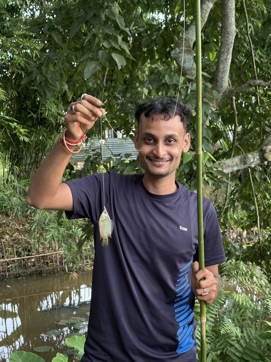 news_tech77282's tweet photo. Simple joys of village life — fishing by the pond with a bamboo rod and a big smile for a small catch! https://t.co/Gd4M82W7Qg