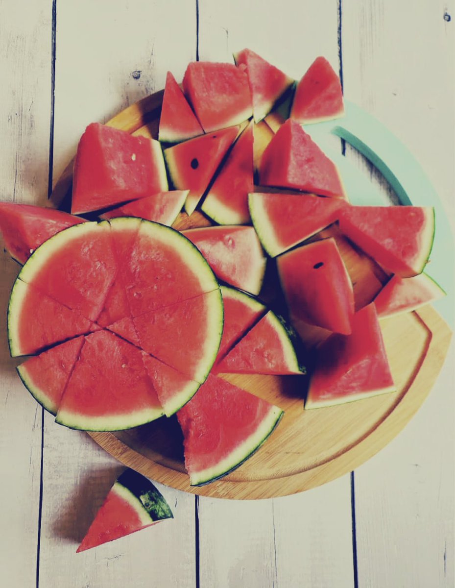 PlayboyCook's tweet image. It’s a sweltering hot day at port and though many of his crewmates were still sleeping, Sanji was up early. With five large watermelons laid out on the counter, adept hands of the chef worked the blade through rind and flesh to cut them into smaller sizes to share.