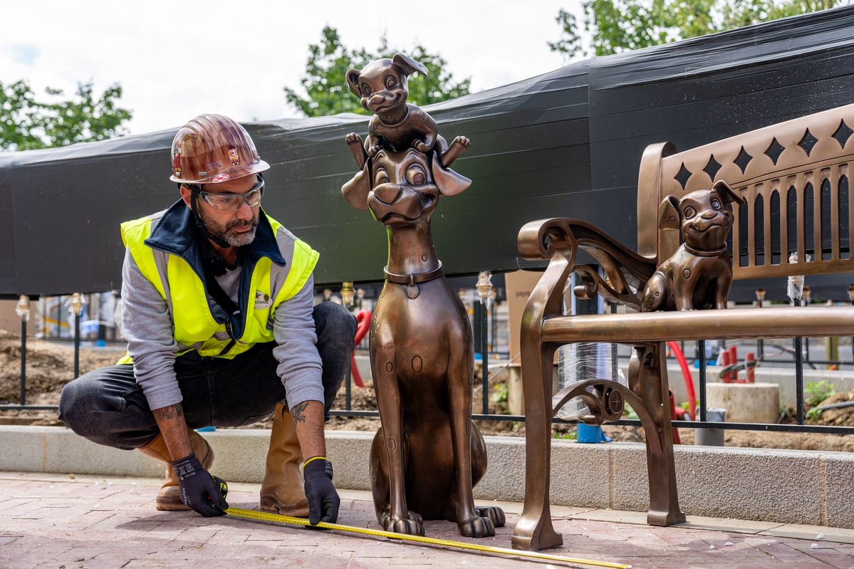 DLPReport's tweet image. 🔧 The bronze statues have been installed in “Gazebo Gardens” at Disney Adventure World. They include Peter Pan perched on a pilaster, Winnie the Pooh sitting on a bench, and Pongo and Dalmatian puppies around another bench: