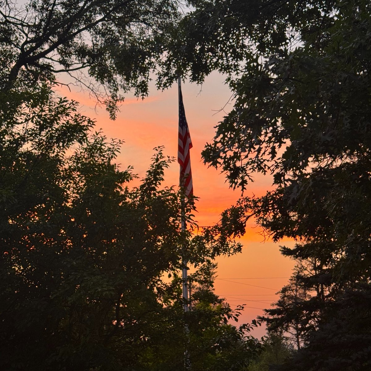 9and10News's tweet image. Viewer Duane got this great shot of a Sunset and our American flag. Thanks for sharing!