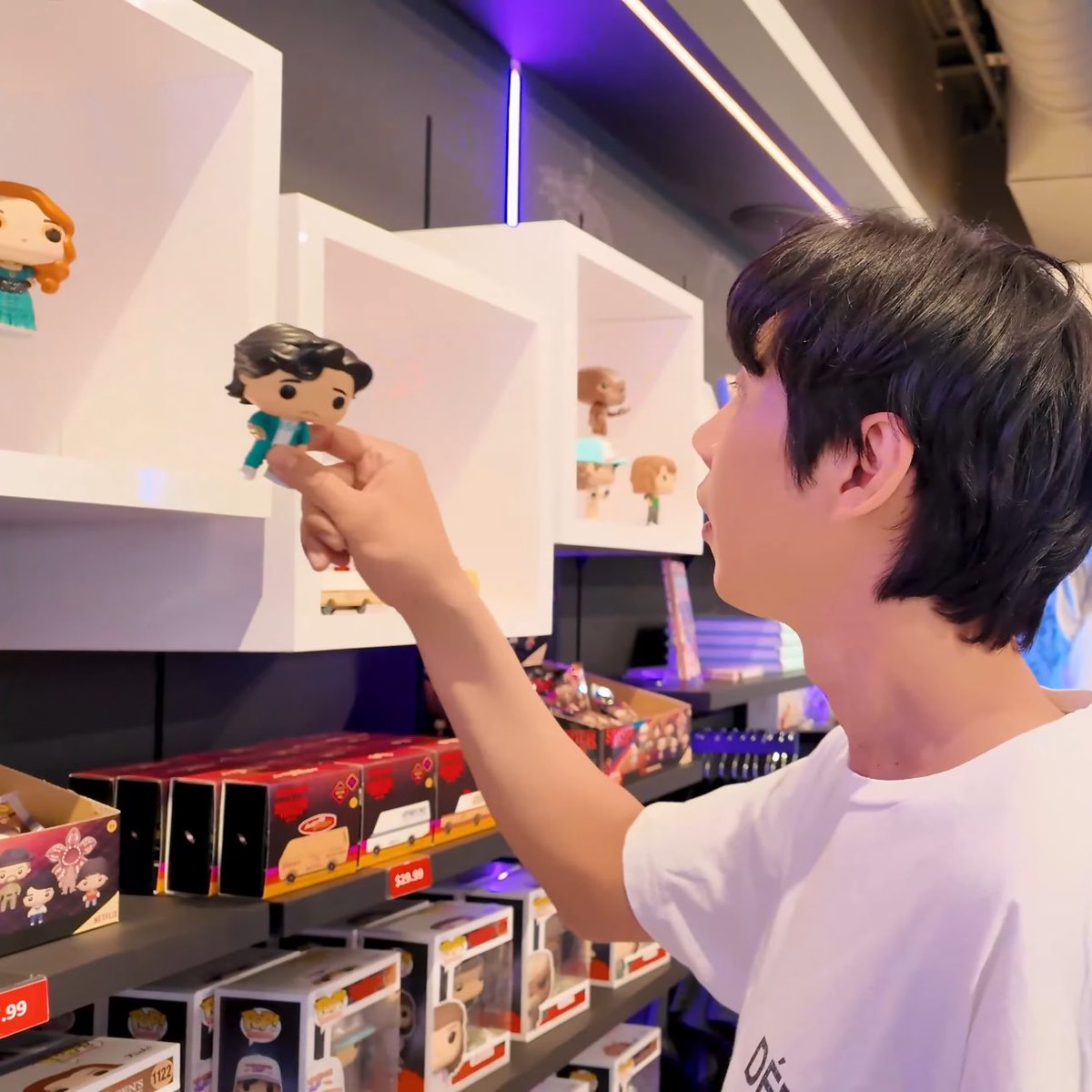 plainlovesong's tweet image. park sunghoon near stranger things merch... when worlds collide