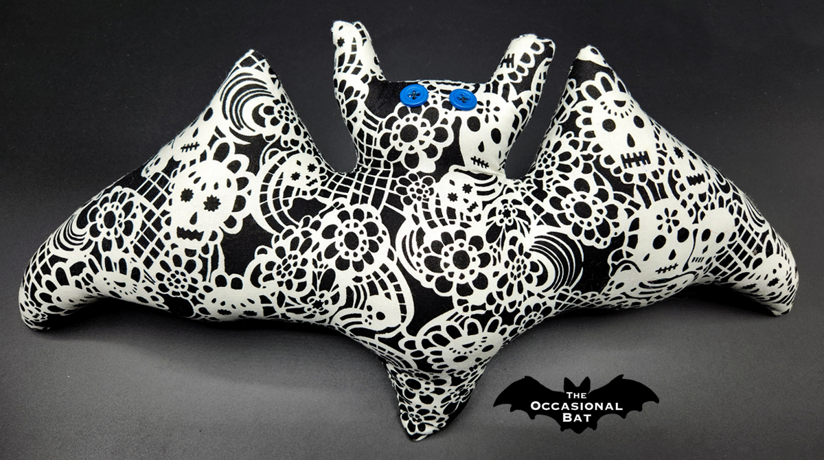 OccasionalBat's tweet image. Embrace your dark side with this stunning black and white lace featuring intricate sugar skulls. 💀 #bat #handmade #pillow #black #white #lace #sugarskull #skull #DíadelosMuerto #batshapedpillow #etsy #shopsmall 🖤🤍🖤 theoccasionalbat.etsy.com/listing/175520…