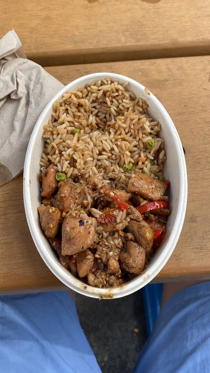 Eating with a spoon. Tastes like shit. It was $18. Not a lot of air conditioning seating. It’s the real Sea World experience.