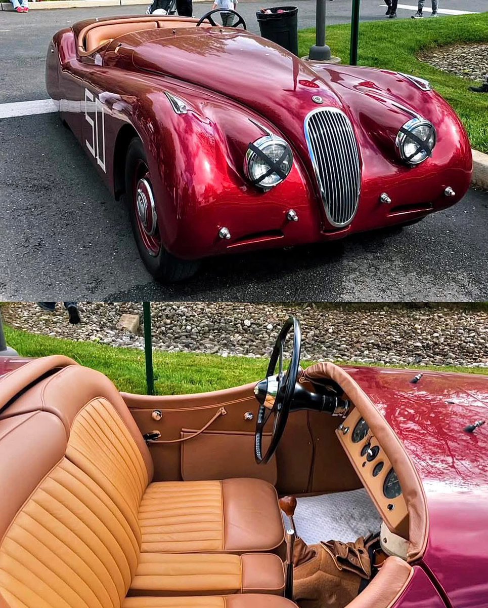 JagmansM's tweet image. This Jaguar XK120 Roadster in deep red channels pure 1950s race energy.