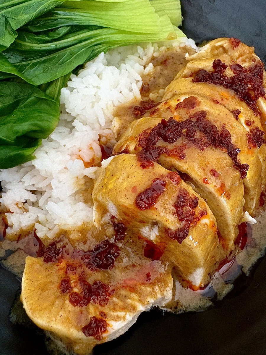 Poached chicken in yellow curry sauce