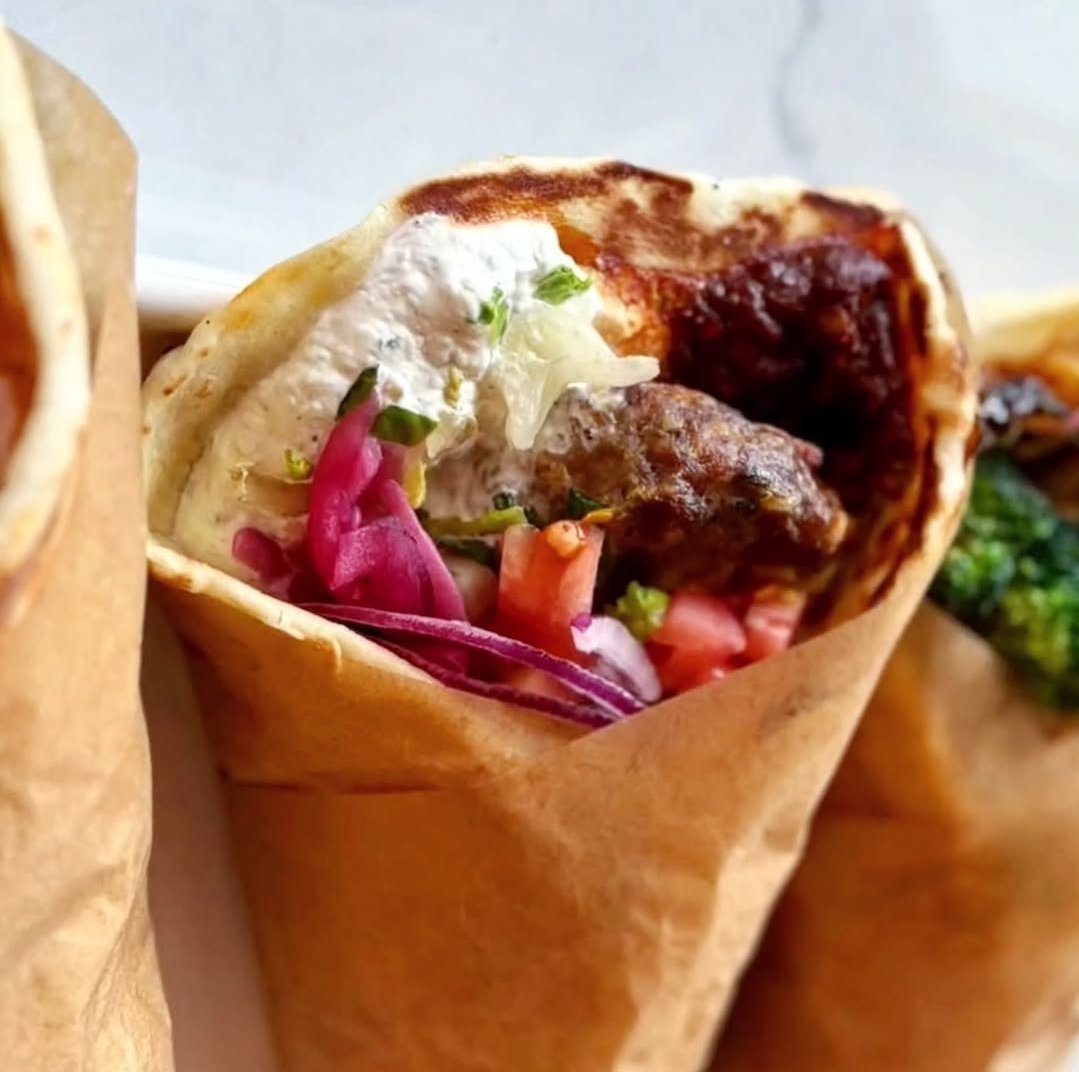 This bite? Next level and chef-approved! 👨‍🍳  

Our *Chef's Choice* pita is loaded with spicy lamb meatballs, tzatziki, harissa, lettuce, tomato, red onion, pickled onions, crumbled feta, and lemon tahini thyme dressing. 😋 

#OttawaFood #CalgaryFood 
#FreshGreekGrill 🇬🇷 | $HBFG