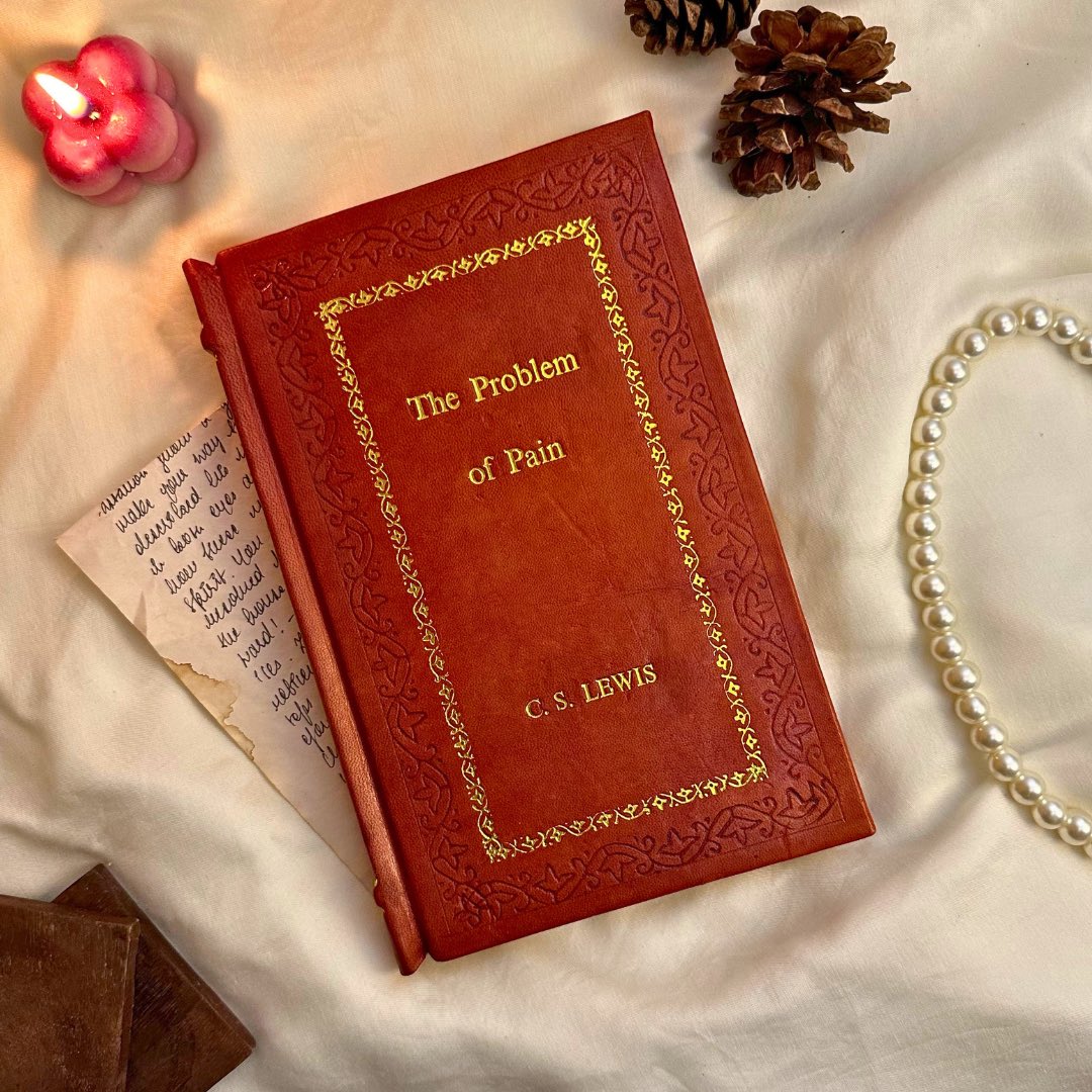 RareBiblio's tweet photo. More than just a book, this is a work of art. 🤎 Presenting #TheProblemofPain by #CSLewis, a #rareBiblio edition bound in our signature brown leather.

#Handembossed border and meticulously placed text speaks to the dedication and true artistry of the #craftsman. ✨ 

This isn’t just #reading; it’s an experience, a statement piece for any discerning #bibliophile. Owning such a #treasure is a source of immense #pride, a testament to the enduring beauty of the #written word, exquisitely presented. 📖👑

Which #book would you #love to get #custombound in luxury? 📚💎