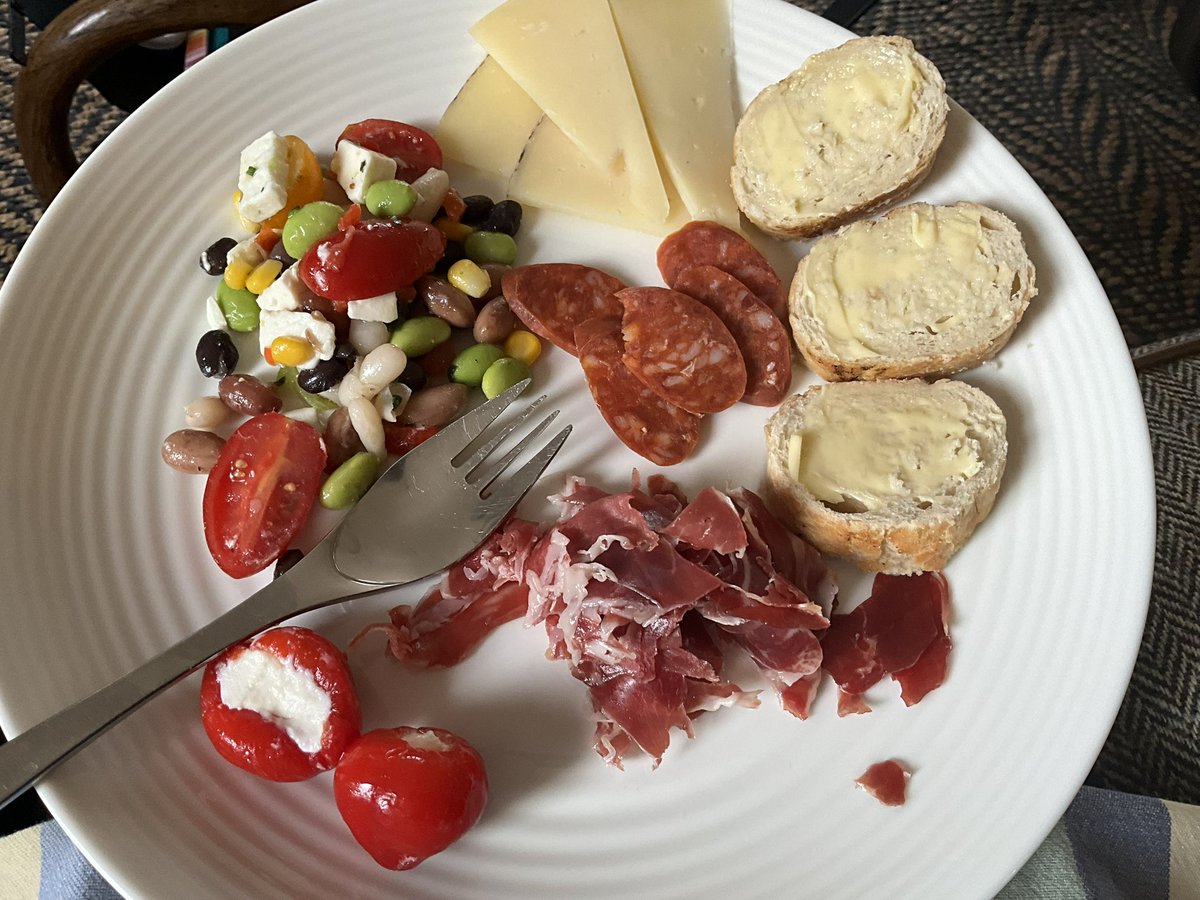 TheLadyFlavell's tweet image. Simple, light summer tapas meal this summer’s evening…the Iberian ham from M&S really is very good…made a bean/feta/tomato salad, manchego cheese, chorizo, stuffed peppers…nothing to it.