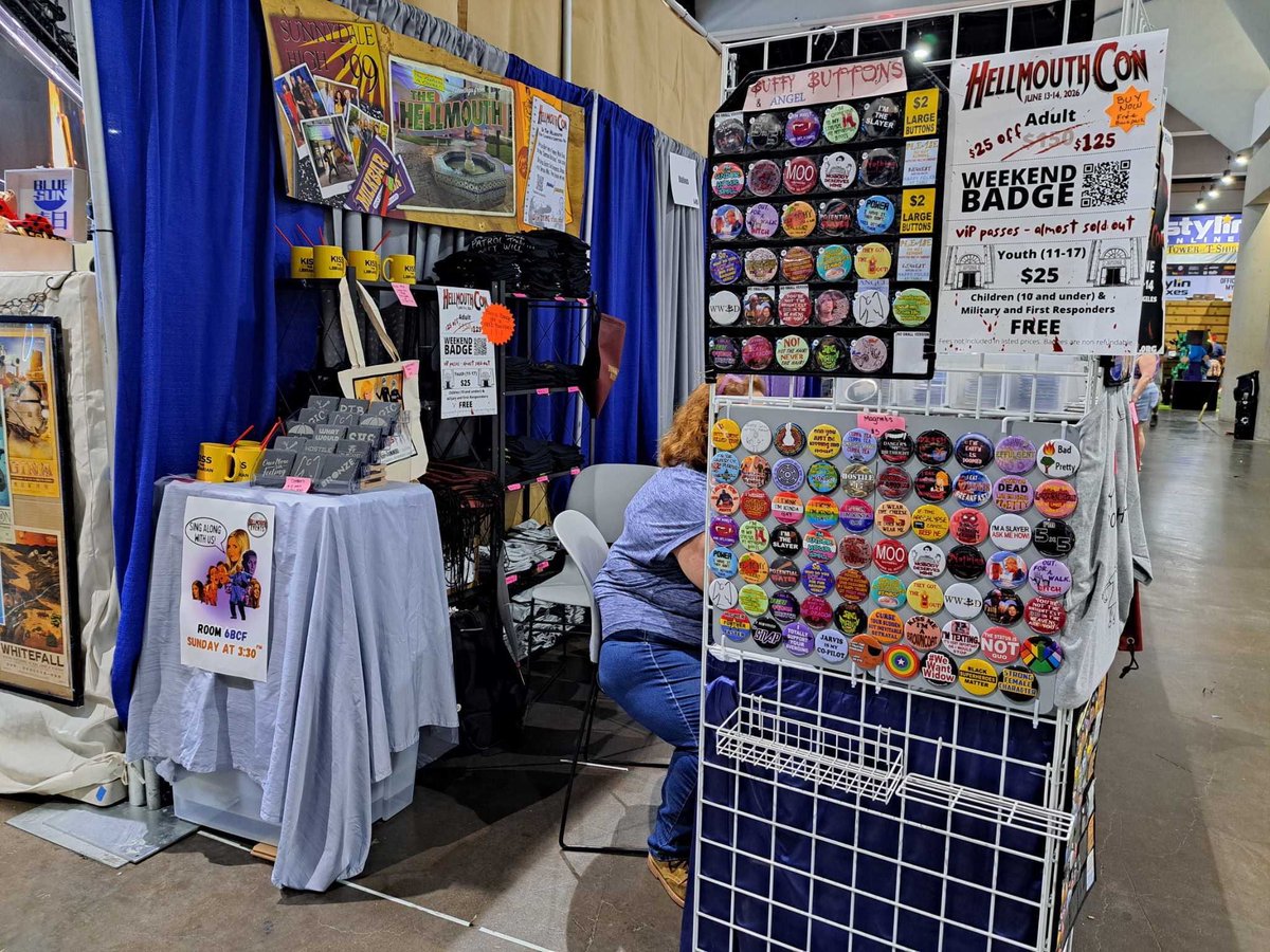 HellmouthEvents's tweet photo. Stop by and say hi! #fandomcharities Booth A06 (at the end of row 400) has buttons and Buffy tees that you will love!! #ComicCon2025 #SDCC2025 #SDCC https://t.co/XTIpTqdikq
