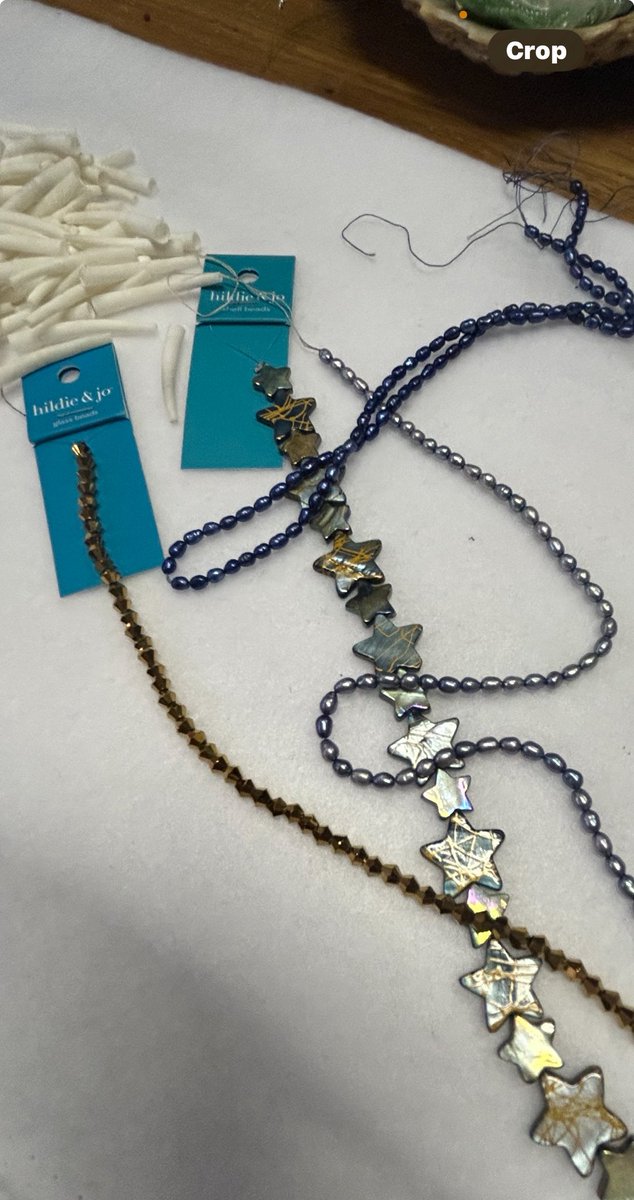 CFarlow58's tweet photo. My latest 7 strand  Dentalium necklace, ‘7 Sisters’.  Dentalium, gray and blue seed pearls, cut gold glass beads, AB crystals, and abalone shell stars. https://t.co/86FiWe7PwC