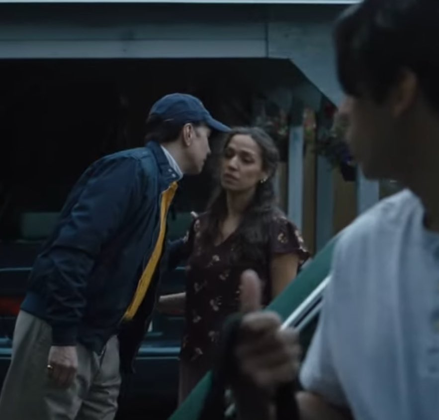Yjcornplate's tweet image. Coach Martinez’ wife is seen to be uncomfortable as he kisses her, implying their relationship is rocky to say the least