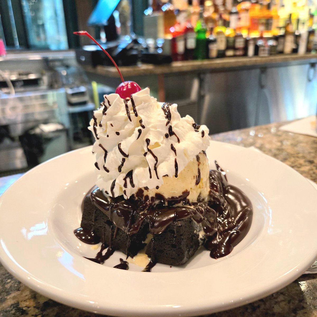 Satisfy your sweet tooth—celebrate National Hot Fudge Sundae Day with a decadent Brownie Sundae from Smokey Joe's Cafe! 🍨