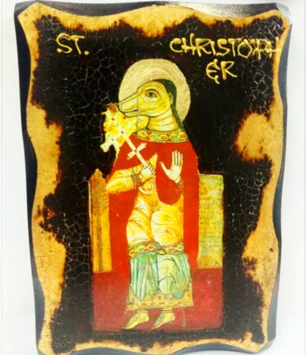 antinousgaygod's tweet photo. 🪷 25 July is the feast day of Psychopomp Saint #Christopher, who started out as #Anubis and then later #Hermanubis conveying souls over Nile. Hence the cynocephalic dog-headed iconography. 🪷 https://t.co/P97NPurRBk