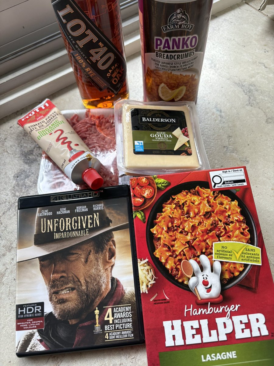 geekcanuck's tweet image. My wife is away and I genuinely miss her and wish she was here. That said, when life gives you lemons… you cook a stupid meal inspired by The Bear, drink bourbon-adjacent Canadian whiskey, and hang out with Clint, Gene, and the Duck of Death. #thebear #unforgiven #PhysicalMedia