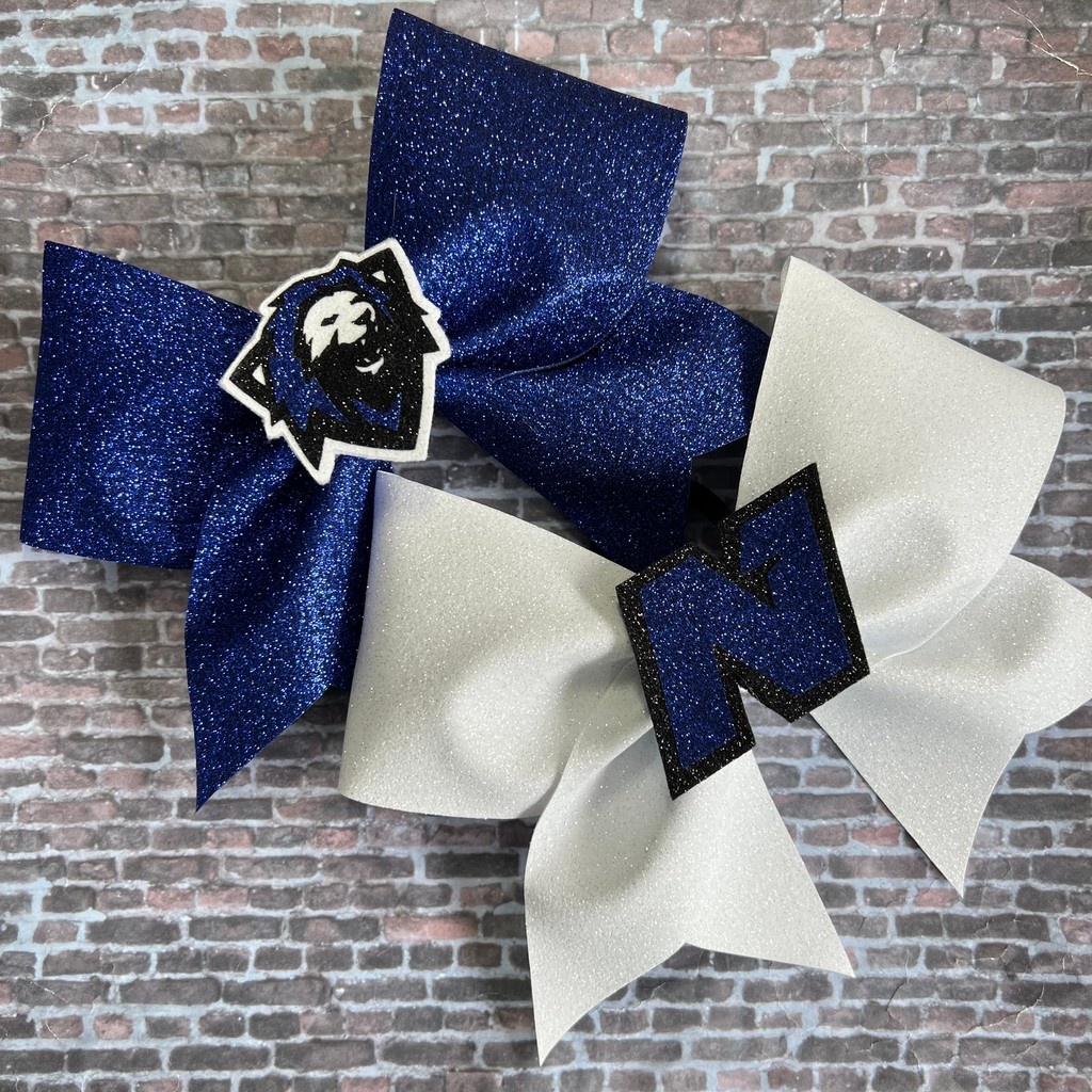 Northwest High School, Missouri team bows 💙🤍🖤 Go Lions!