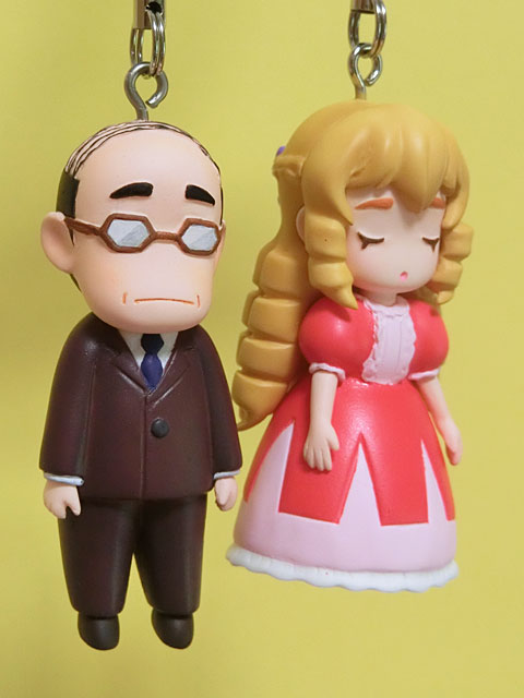 新作告知。
「悪役令嬢転生おじさん」から“憲三郎＆グレイス”完成しました。ミニキャラでストラップになります。 よろしくお願いいたします。#WF2025S  #WF2025夏