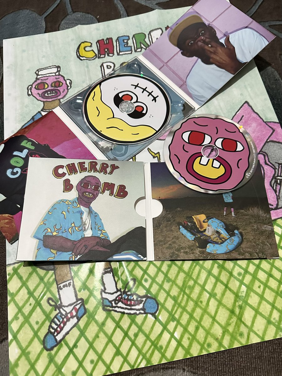 tylerthefilter's tweet image. I also came to flex that i bought WOLF and Cherry Bomb CDs (I managed to get the og one, not the anniversary version)