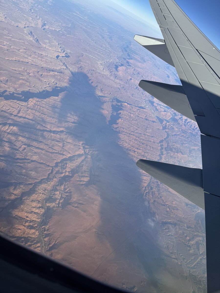 bobacupcake's tweet image. whys the enormous shadow cast across the desert look like its about to take a bite of an apple before hesitating and then throwing the apple into the air where it gets caught by an ordinary human magician on a broom who takes a bite of the apple and then