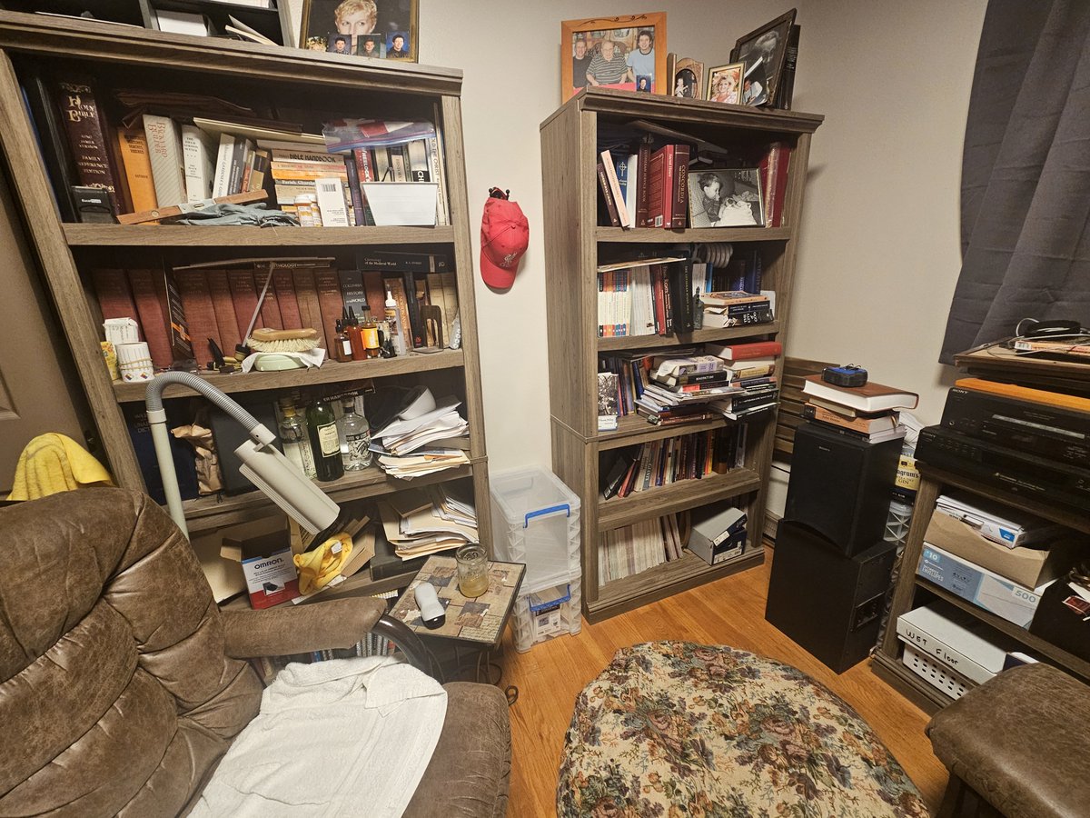 Command Central has a new look. TV mounted on the wall and a fridge for my man sodas. And enough reading materials to last longer than me.