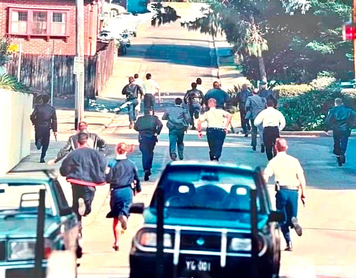 lowlandsapien's tweet image. Police running towards the Strathfield Massacre, Sydney 1991
Committed by Wade Frankum with an SKS and a Bowie Knife, 8 dead, 6 injured he apologised to a woman he was trying to carjack and shot himself.
Apparent obsession with American Psycho and violent material.