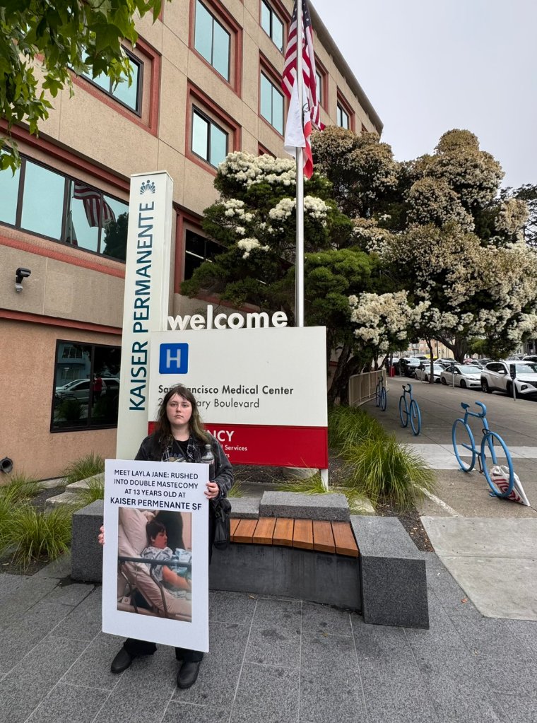 Layla Jane🦎 (@ljdetrans) on Twitter photo I showed up to Kaiser In SF today to counter protest everyone upset about the ban. This is the exact hospital that maimed me, and I'm glad they are halting the surgical harm. It's a step in the right direction. <a href="/bourne_beth2345/">Beth Bourne</a> <a href="/WomenAreReals/">WomenAreReal</a> <a href="/DIAGdemocrats/">DIAGdemocrats</a> I showed up to Kaiser In SF today to counter protest everyone upset about the ban. This is the exact hospital that maimed me, and I'm glad they are halting the surgical harm. It's a step in the right direction. <a href="/bourne_beth2345/">Beth Bourne</a> <a href="/WomenAreReals/">WomenAreReal</a> <a href="/DIAGdemocrats/">DIAGdemocrats</a>