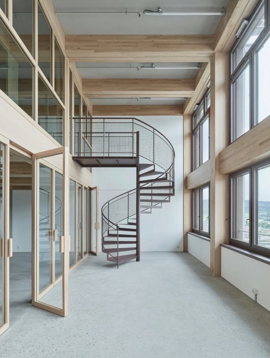 Construction is evolving! 

24-storey tower in Switzerland
- Mass timber structure
- PV facade
- Even rammed earth cladding on the lower floors

By Boltshauser Architekten - a thread 🧵