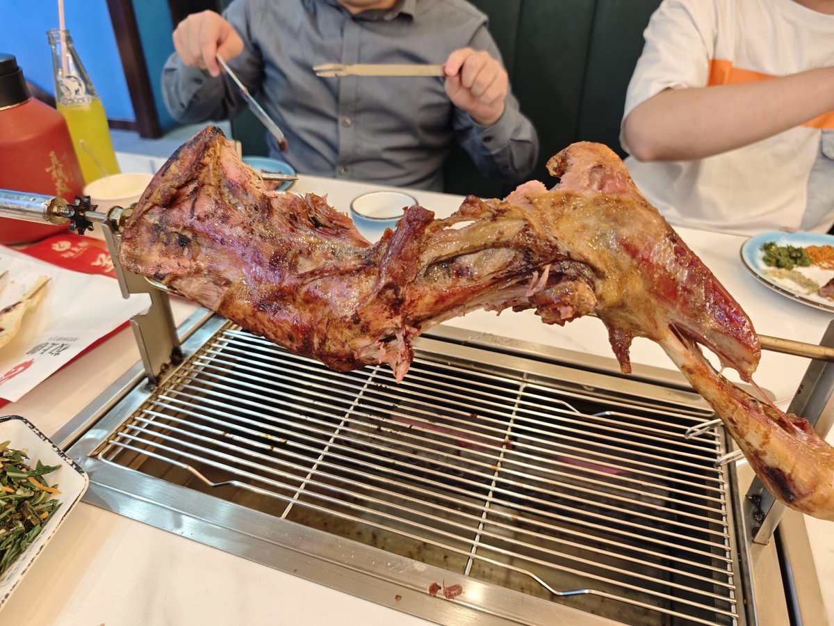 Whole roast leg of lamb for dinner in Ordos last week.

With a coupon from Dianping, this was 195 CNY (28 USD). Regular price 250 CNY (35 USD).