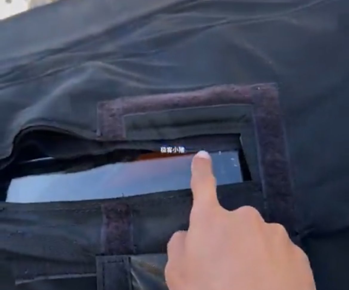 DominicBRNKMN's tweet photo. Some details about the upcoming, cheaper version of the Model Y: ✌🏼

New headlights 💡 
The main headlight unit has been moved up to where the DRL would normally be. This indicates that it will not feature the split headlight design and might even get rid of the front ightbar.

New tail light design 🔺
The textured silver stripe below the rear light is gone and is now painted in body color. The cheaper Model Y might not get an indirect light bar in the rear.

Interior 💺
The middle console seems to have a new shape that stops behind the cupholders (possibly more Cybertruck-like) and the rear entertainment display is gone.