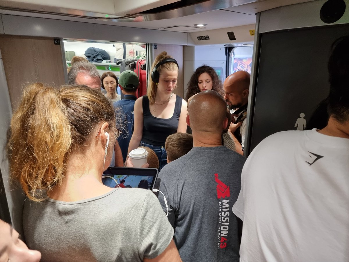 julietrix1's tweet photo. We need people to travel by #TRAIN (for our climate survival). It really needs NOT to be like this @GWRHelp. I am squeezed into the bike rack, others dtrugglong even to get onto the train. How can you charge 10s of £ for this?? #trains #ClimateCrisis #transport https://t.co/9zcnwWJBST