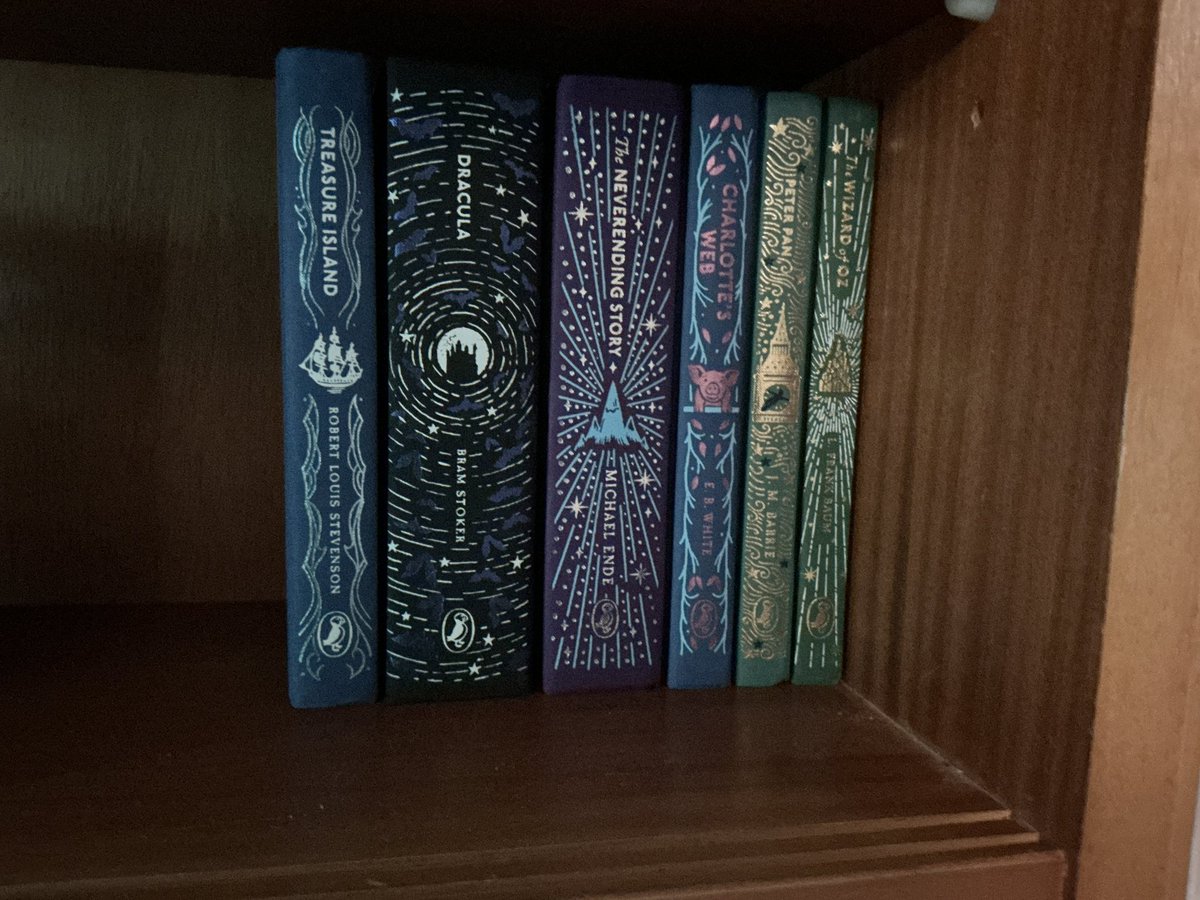 from_nook's tweet image. I’m so glad I asked @bertsbooks to set up the Puffin subscription, they’re so pretty. A lot sparklier than you can see in the photo. #SaturdayShelfie