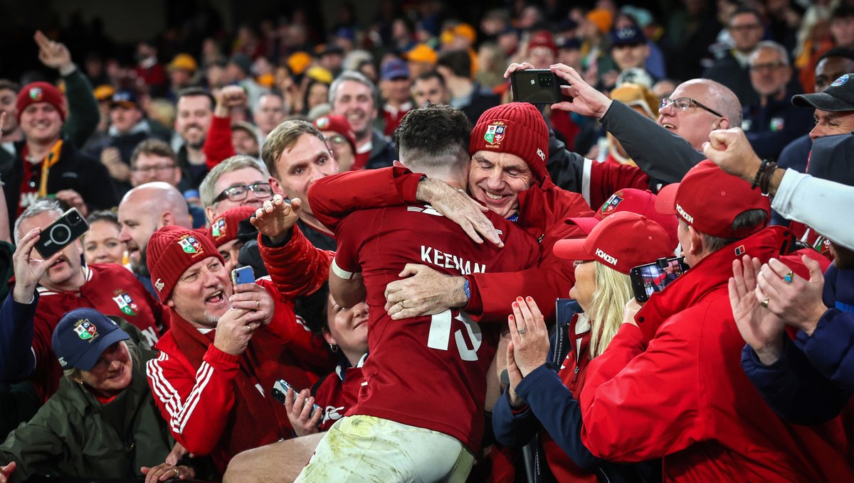 Hugo Keenan is embraced by his father Paul after he scored the winning try to clinch the series for the British &amp; Irish Lions at the MCG