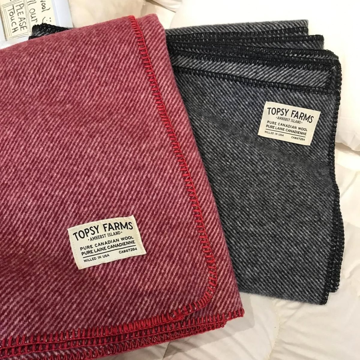Canuckle #1169: TOPSY 🐑🧑‍🌾🧶
Nestled on Amherst Island in Ontario, Topsy Farms is a family-run sheep farm that’s been growing strong since the 1970s. From their flock of pasture-raised sheep, they produce 100% Canadian wool blankets—crafted with care, sustainability, and zero