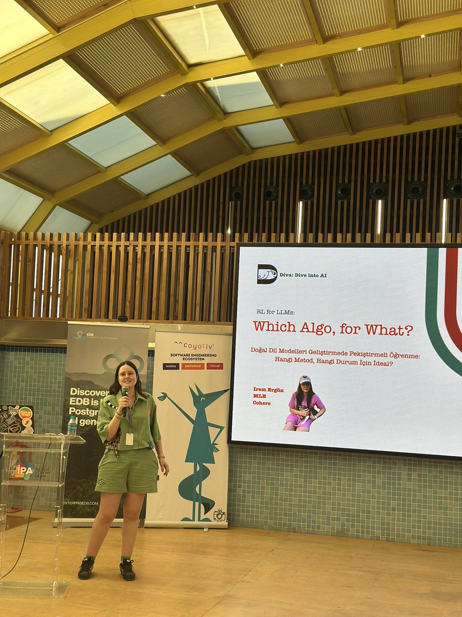 DIVA 2025 Hangar sahnesinde
 İrem Ergün “ Doğal Dil Modelleri Geliştirmede Pekiştirmeli Öğrenme: Hangi Method, Hangi Durum için İdealdir?” Başlıklı konuşması ile bizlerle!