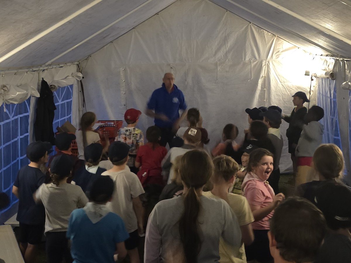 3rdBanstead's tweet image. A sudden downpour doesn't spoil our fun.  Camp fire songs indoors along with our cubs performing.