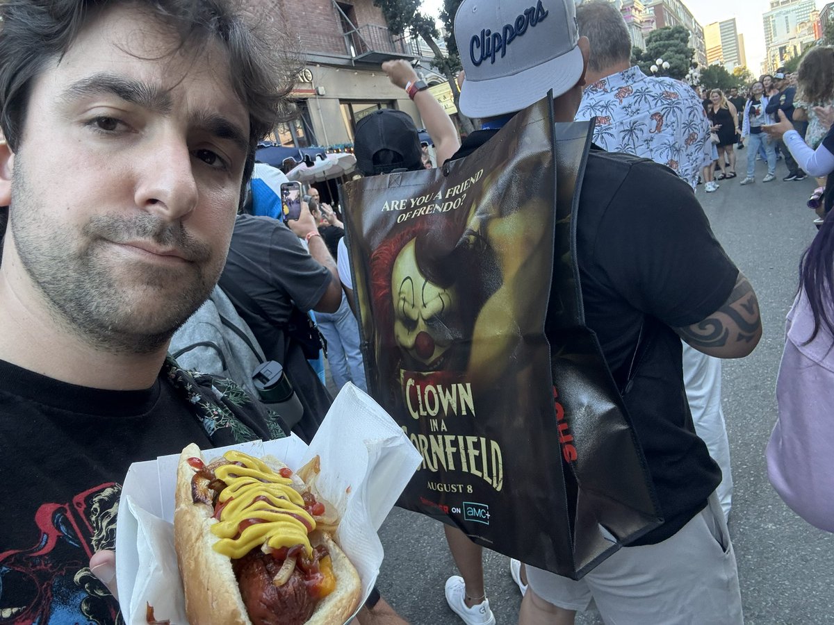 Adam_Cesare's tweet image. Def not posing with this stranger’s bag, just taking a picture of this hot dog.