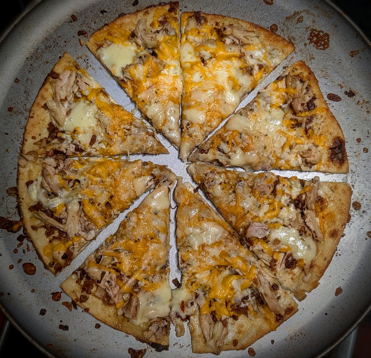 BBQBryan's tweet image. Made another Chicken Bacon Ranch Cheddar Pizza this week. Switched to a round pizza crust rather than a croissant sheet. 
I&apos;ll get around to making my own dough, I&apos;ve made it a couple times before, but want to dial in my topping game