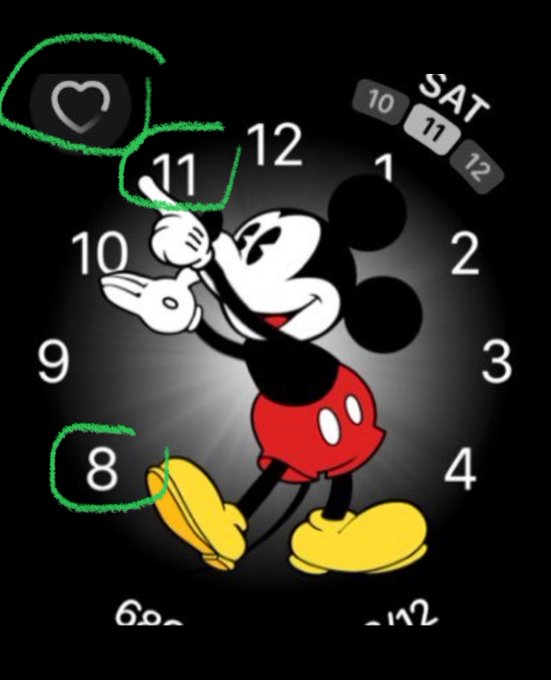 Mickey Mouse clock with highlighted numbers 8, 11, and a heart symbol